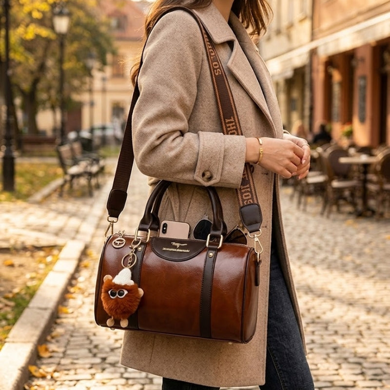 Women's Glossy Handbag with Playful Furry Pendant