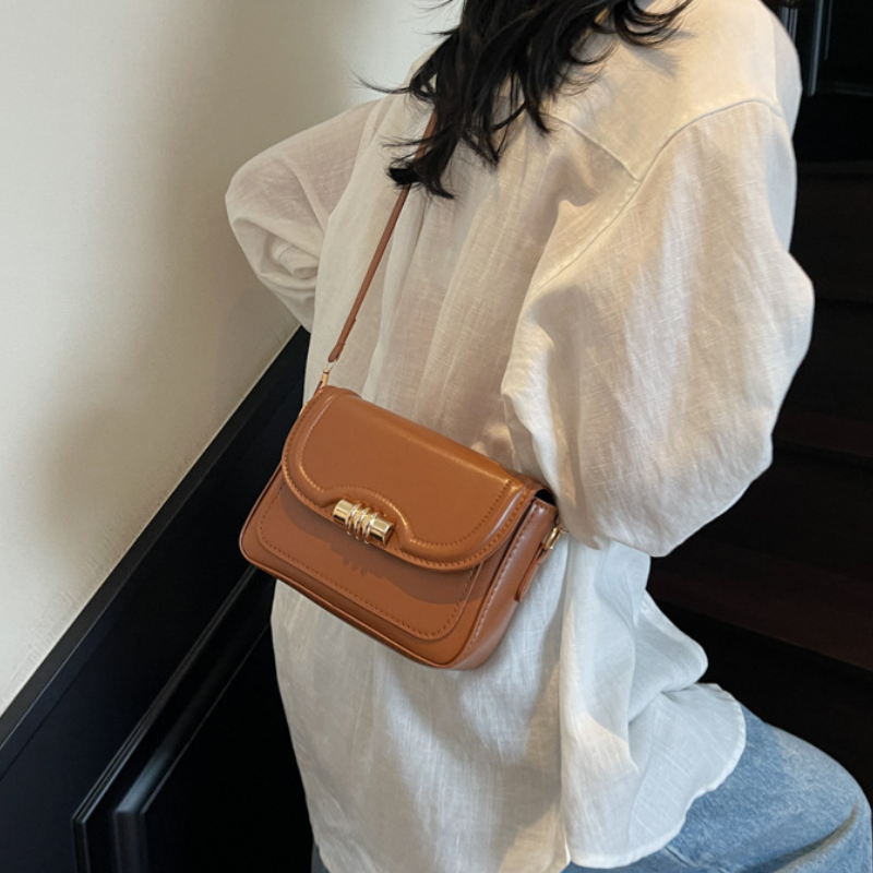 Luxe Gold Lock Crossbody Bag