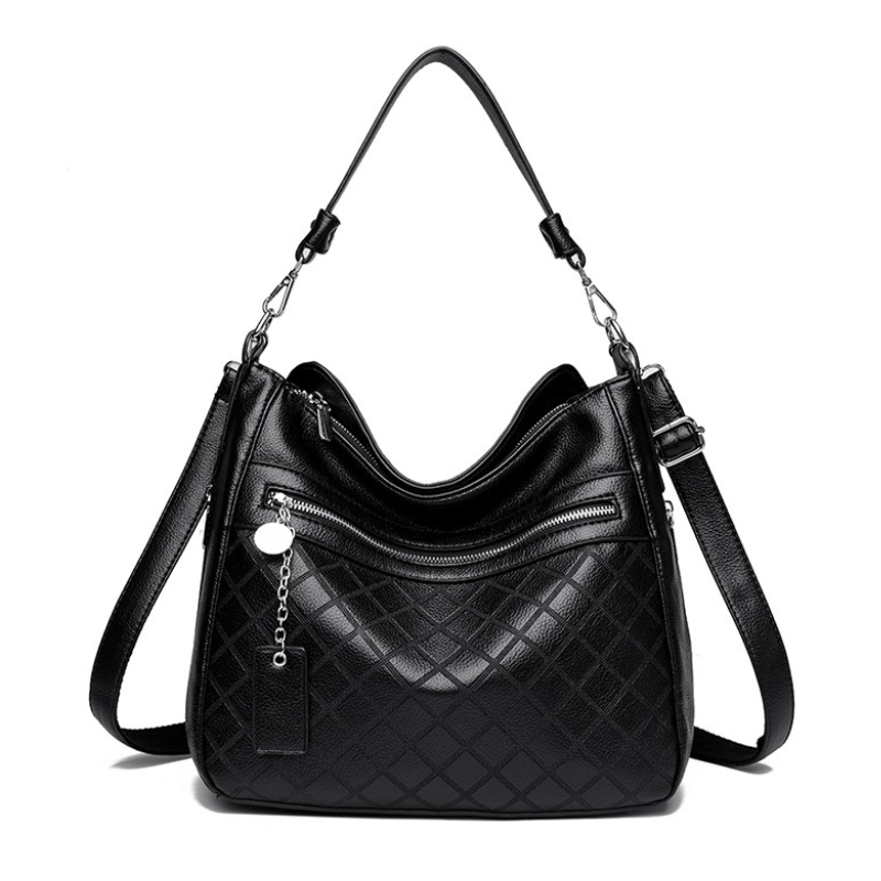 Soft brown leather shoulder bag with multiple compartments and adjustable strap