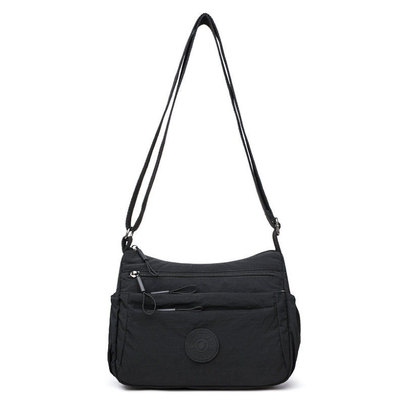 The Silhouette Slide Crossbody Bag