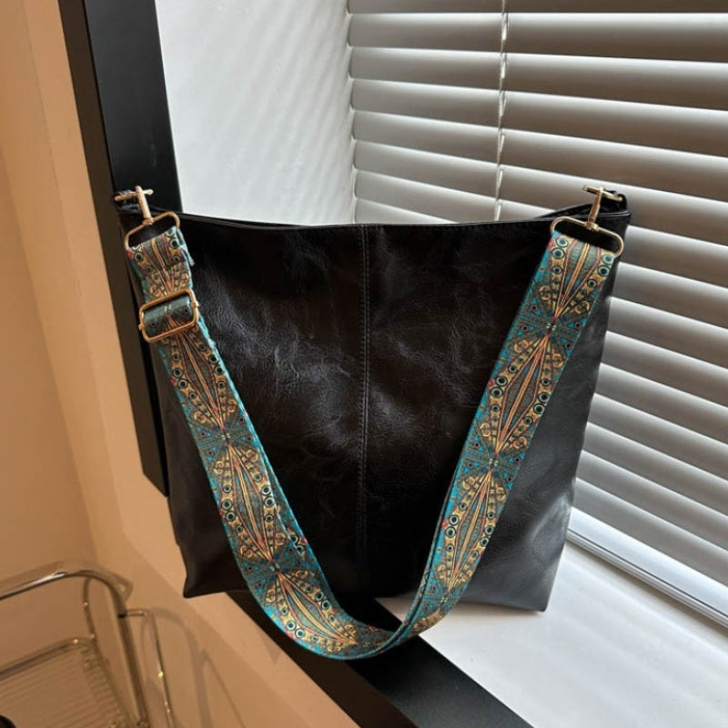 Women's Textured Leather Shoulder Bag with Patterned Strap
