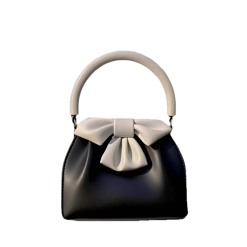 Elegant Bow Accent Handbag with Round Handle