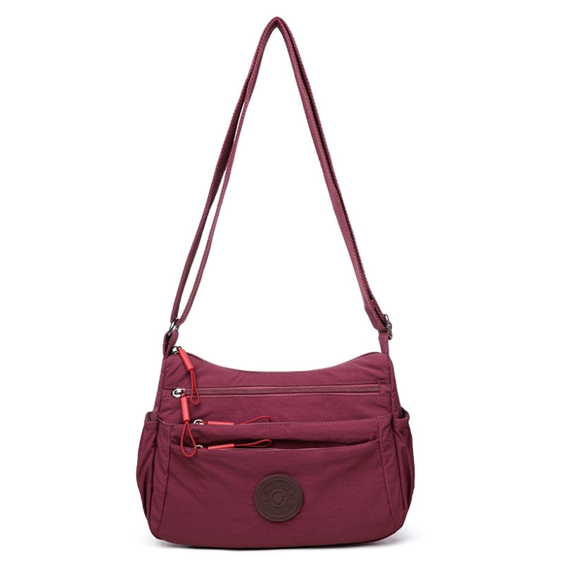 The Silhouette Slide Crossbody Bag