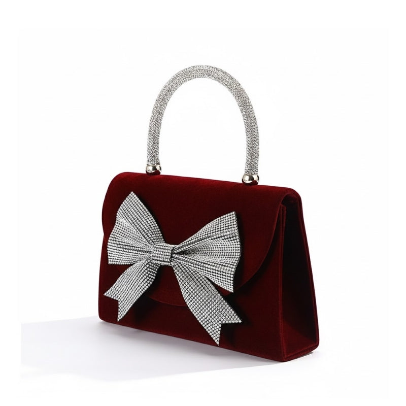 Elegant Velvet Handbag with Oversized Crystal Bow
