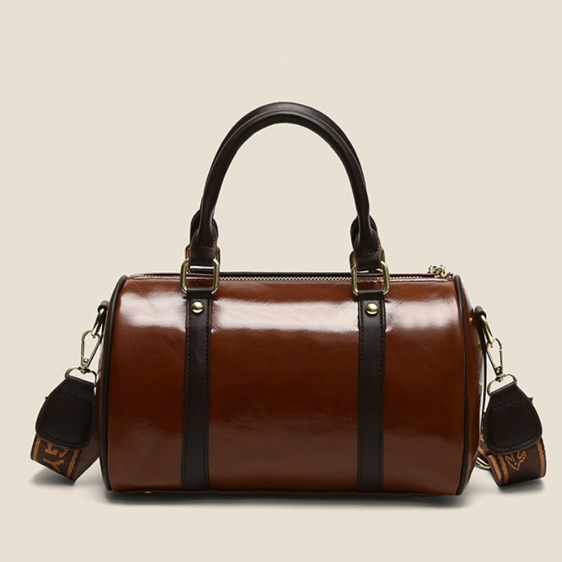 Women's Glossy Handbag with Playful Furry Pendant