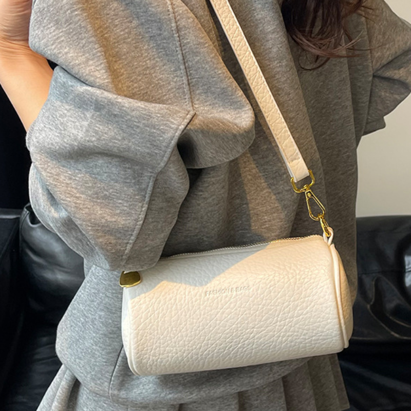 Elite Roll Crossbody Bag